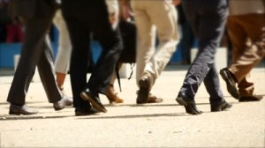 Dockside_walking-group-of-people-team-spirit-close-up-of-foots-business-persons-background