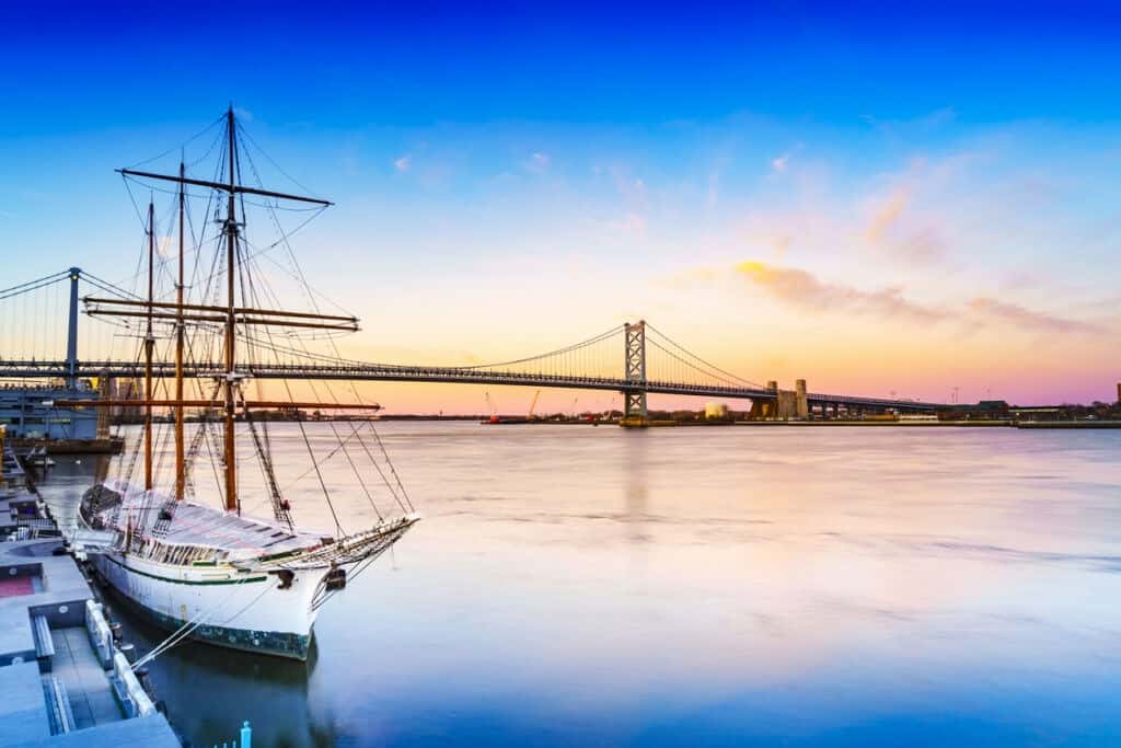 sunset over philly bridge