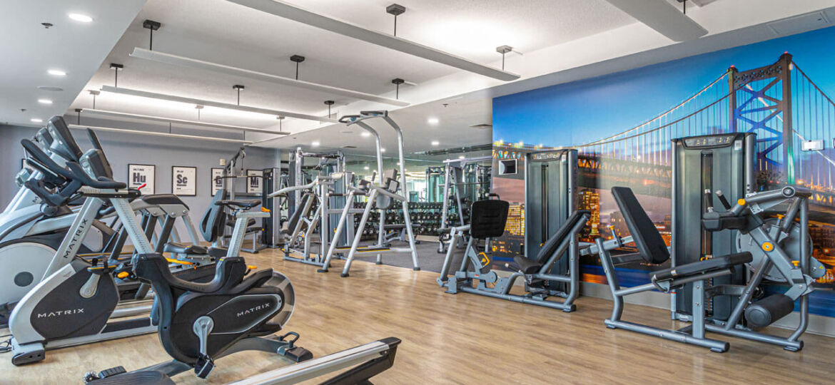 Luxury fitness center with cardio and strength training machines at Philadelphia condos for sale