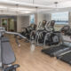 Cardio machines with gorgeous riverfront view in Philadelphia condo fitness center