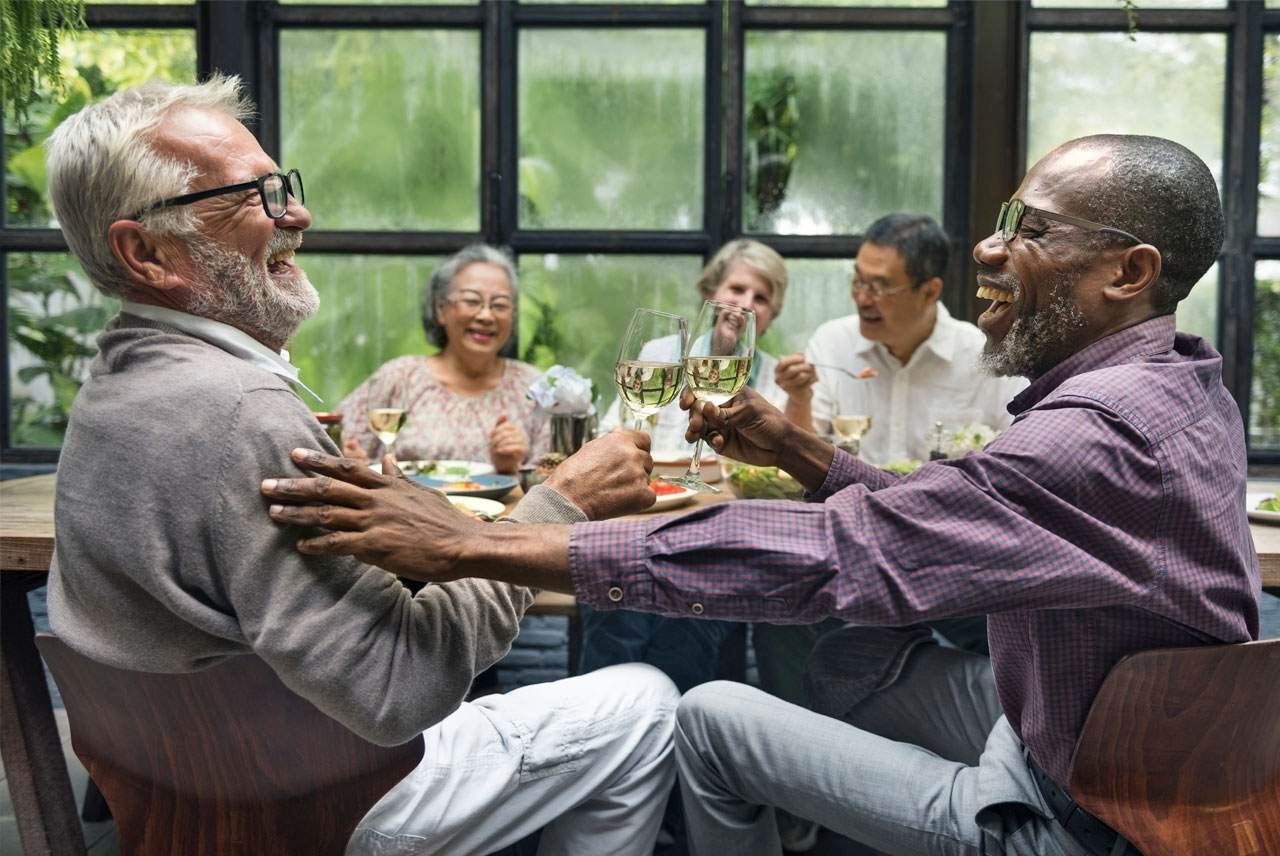 Residences at Dockside friends enjoying dinner at Penn's Landing area restaurant